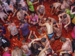 Revellers throw tomatoes at each other during the annual "Tomatina", tomato figh...