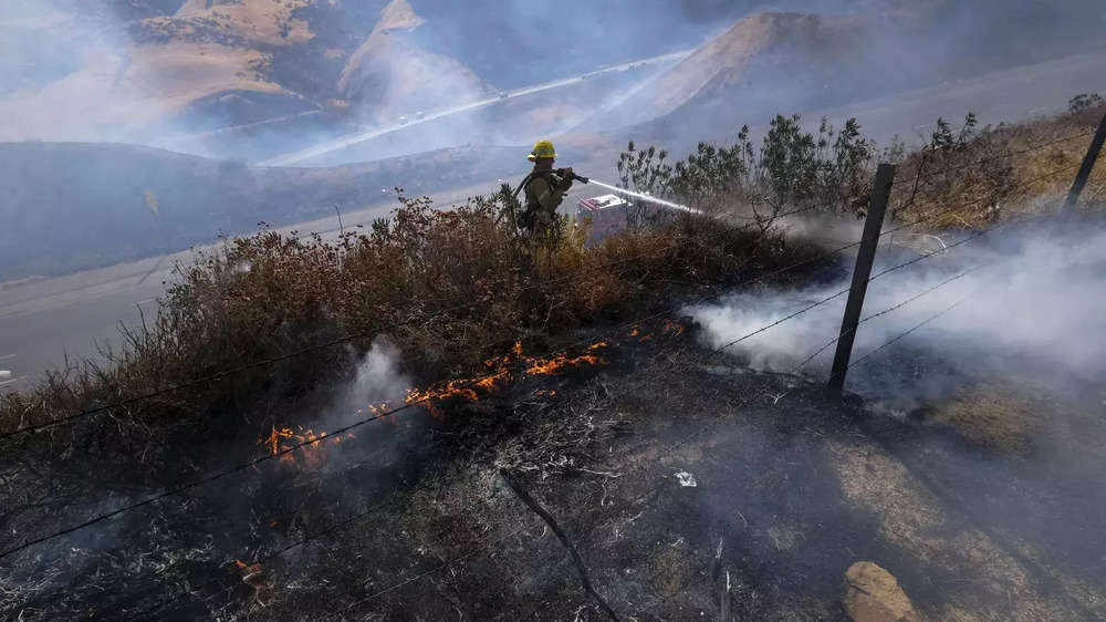 In Pics: California Wildfires Prompt Evacuations Amid Heat Wave | The ...