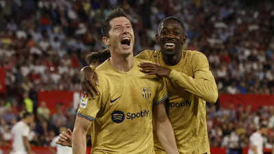Robert Lewandowski leads Barcelona to win at Sevilla as Real Madrid stay perfect, Atletico Madrid held