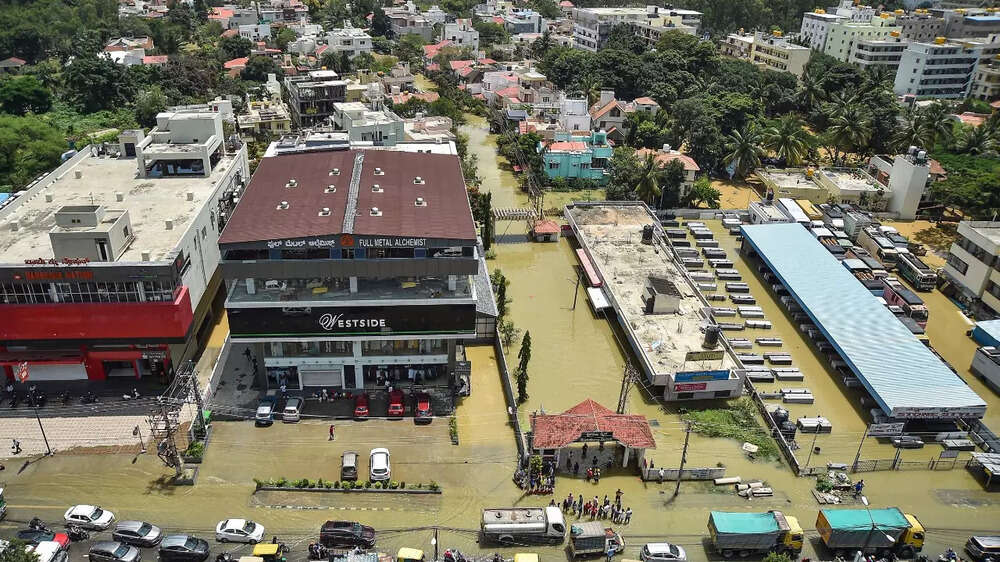 An aerial view of flooded Rainbow Drive Layout after heavy monsoon rains in Bengaluru. (Photo: PTI)
