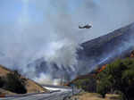 Crews face heat wave along with California wildfires