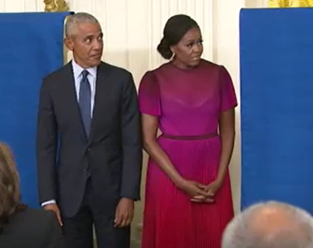 
US: Obamas return to WH for official portrait unveiling
