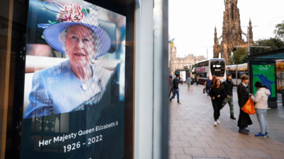 Queen Elizabeth II begins solemn final journey