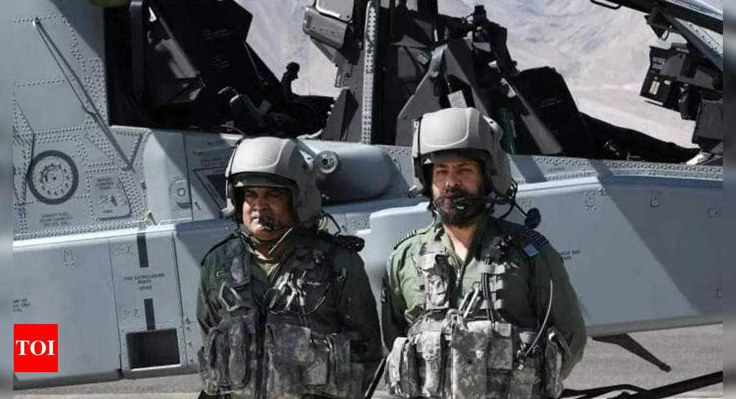 Army chief flies in IAF’s Apache attack helicopter in Ladakh | India News – Times of India