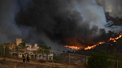 New wildfire spreading in central California mountains