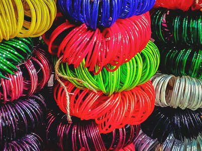Women in Bihar making bangles out of liquor bottles