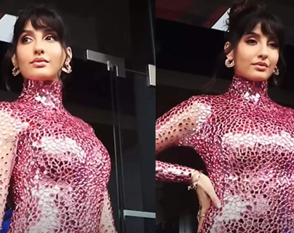 
Nora Fatehi stuns all in a pink embellished figure-hugging gown
