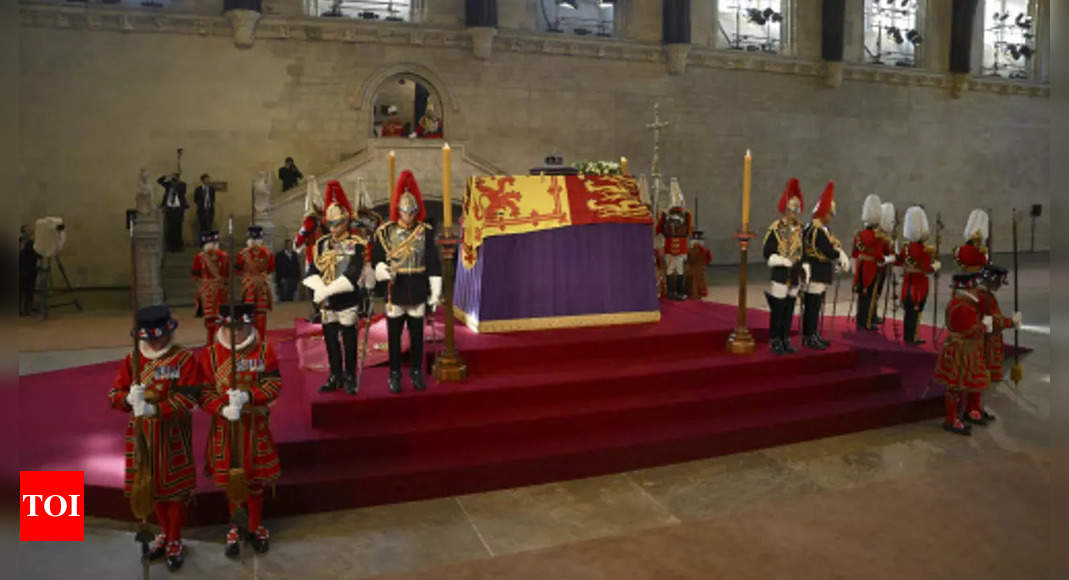 ‘Love a queue’: Thousands line up to pay their respects to the Queen