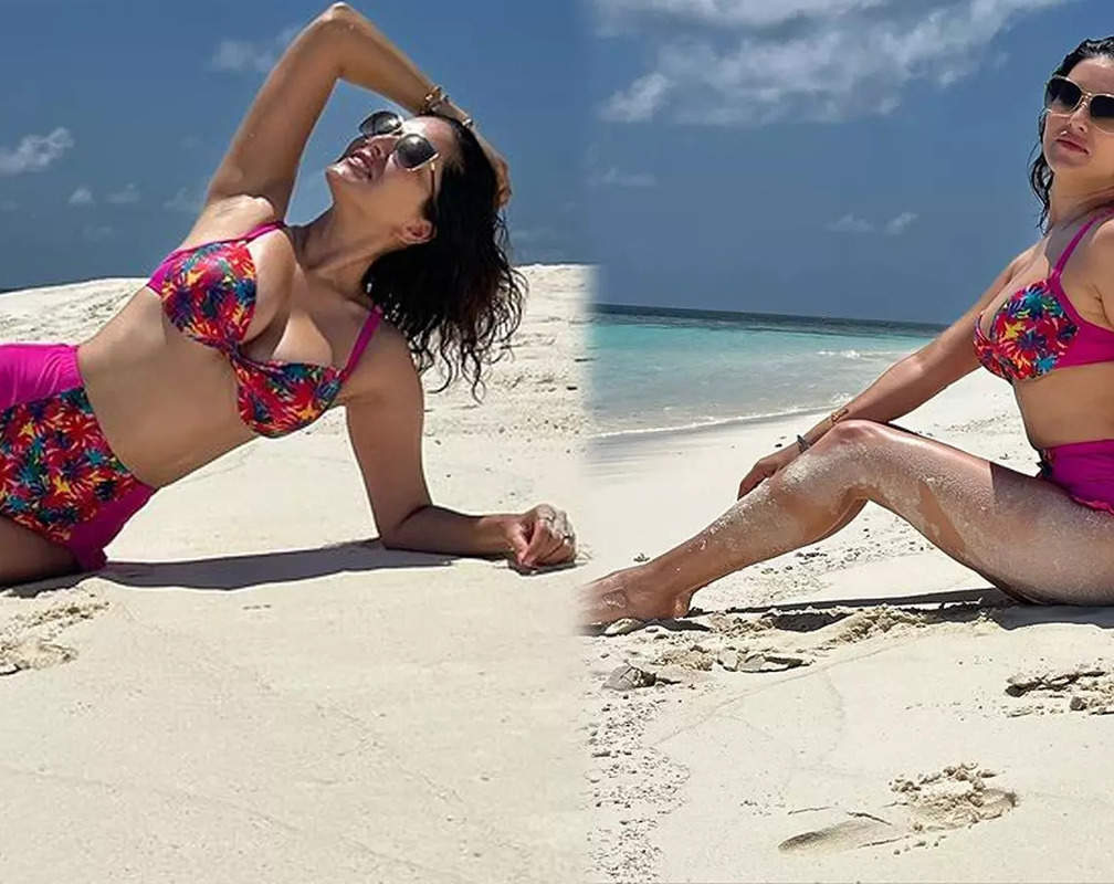 
Sunny Leone looks stunning in a pink bikini as she enjoys beach vibes
