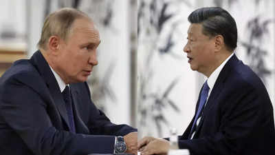 Putin condemns 'attempts to create unipolar world' in talks with Xi Jinping