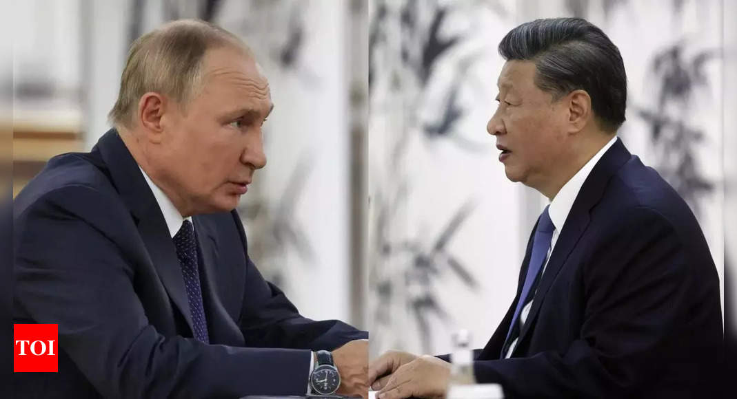 Putin condemns ‘attempts to create a unipolar world’ in talks with Xi Jinping