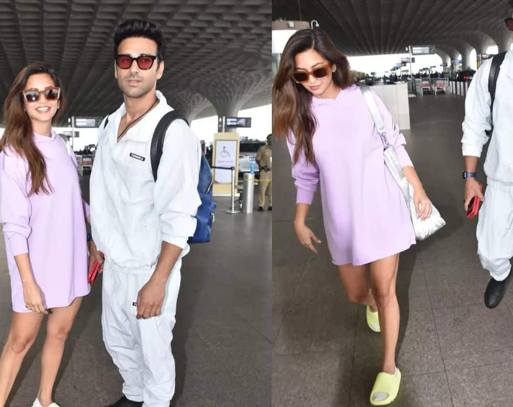 
Couple goals! Kriti Kharbanda looks super cute in her one-piece lavender dress where as BF Pulkit Samrat opted for an all-white look for the journey
