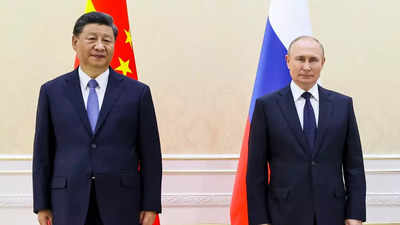 Xi Jinping removes mask for Putin but doesn't mingle outside China's Covid cocoon