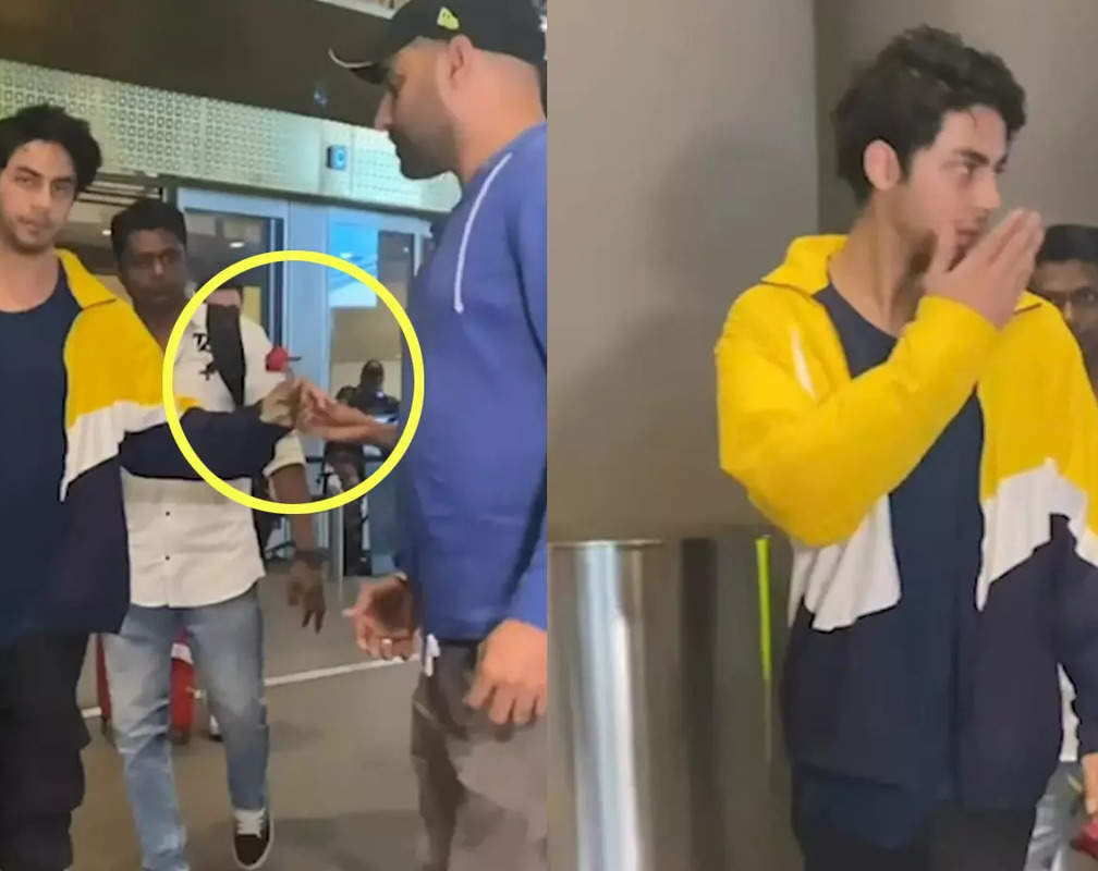 
Like Father, Like Son! Aryan Khan accepts a red rose with salaam from fan at airport, netizens compare him with dad Shah Rukh Khan
