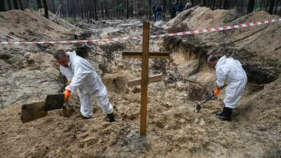 Ukraine says graves and 'torture centres' found in recaptured east