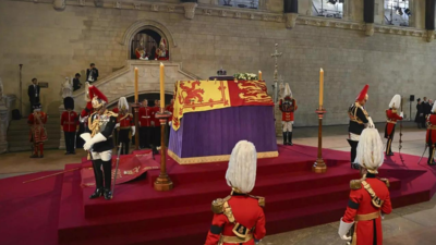 King Charles visits Wales as lying-in-state queue paused due to swelling numbers