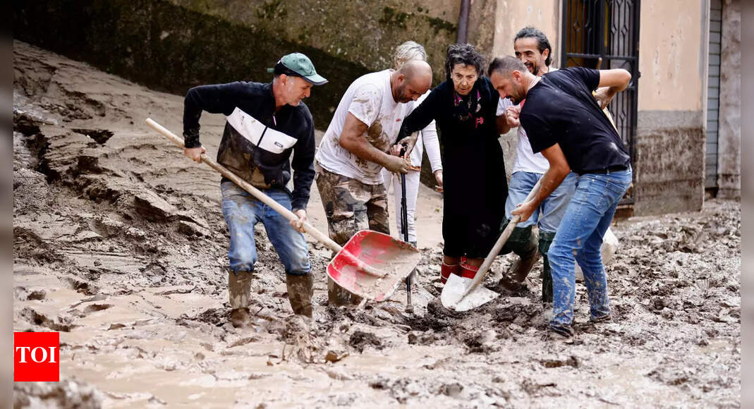 Floods in Italy kill 10; Survivors plucked from roofs, trees Times of