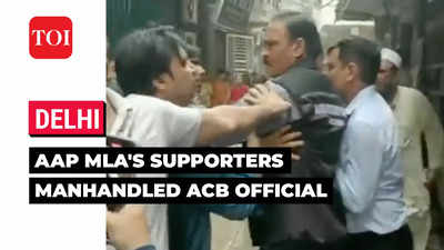 AAP MLA Amanatullah Khan's supporters manhandle ACB official during raids in Jamia Nagar