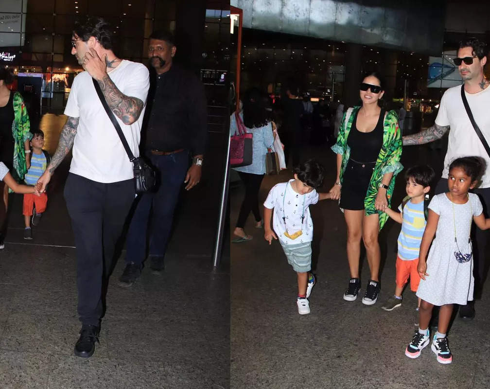 
Sunny Leone makes heads turn in a black crop top with black shorts, gets clicked with her family at the airport
