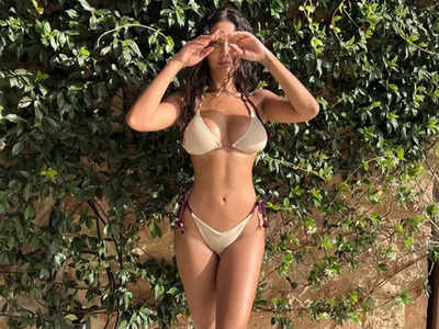 Esha Gupta scorches up Instagram with her latest bikini pic; says 'still summer somewhere'