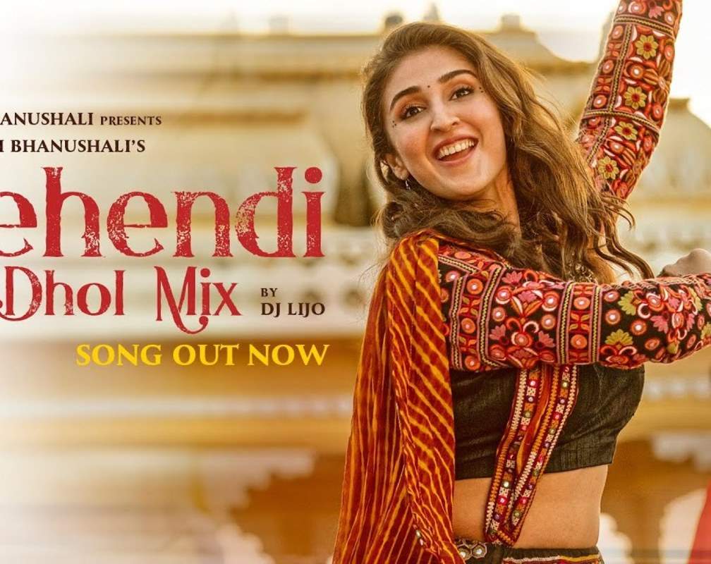 
Watch Latest Hindi Video Song 'Mehendi Dhol Mix' Sung By Dhvani Bhanushali And Vishal Dadlani
