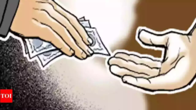 Two Karnataka Industrial Area Development Board officials trapped while returning Rs 2.5 lakh bribe