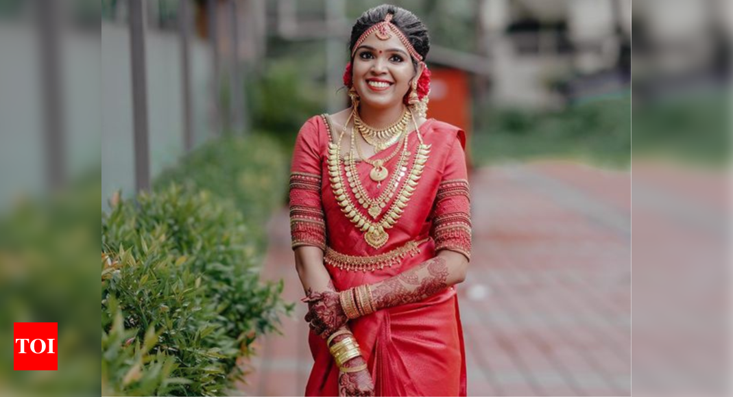 A wedding photoshoot by a bride along a large pothole went viral ...