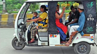 Noida: Baby strapped to her, single mom drives e-rickshaw for a living