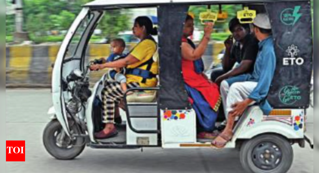 Noida: Baby strapped to her, single mom drives e-rickshaw for a living ...