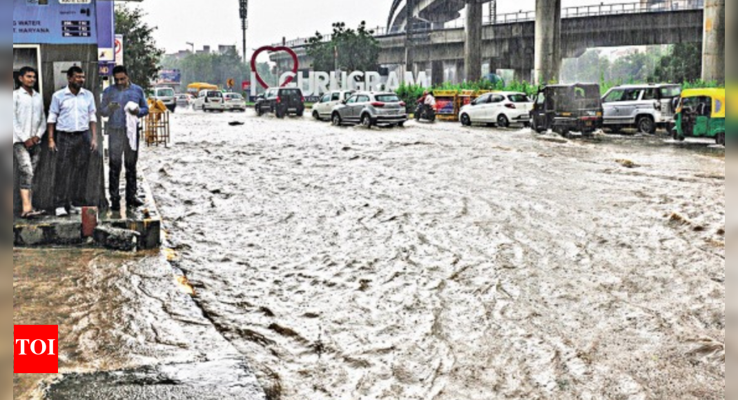 Gurgaon Flood Downpour floods roads in Gurugram; Met predicts yellow