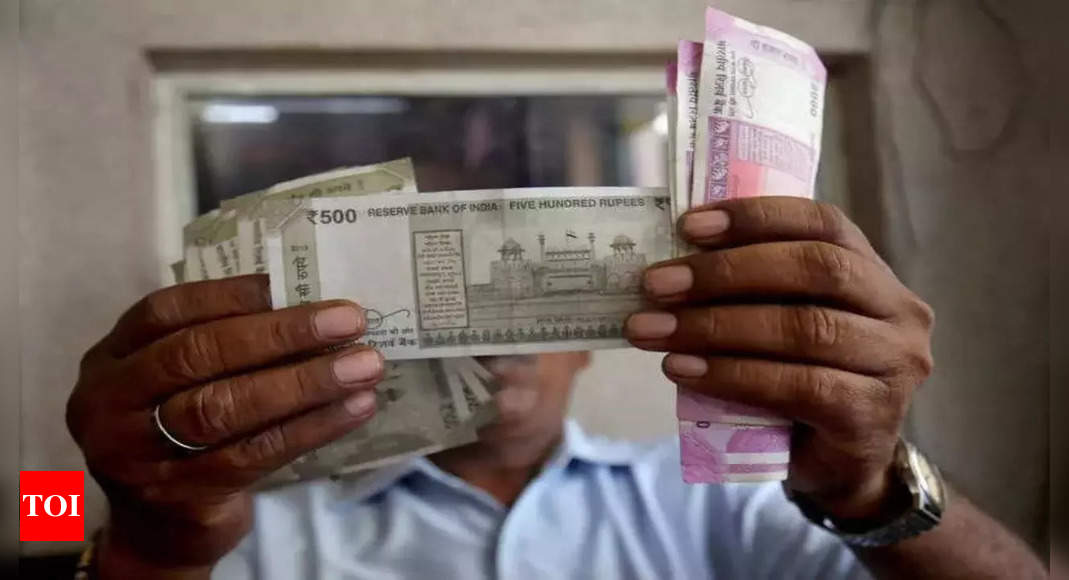 Rupee slips below 81-mark against US dollar for first time in early trade – Times of India