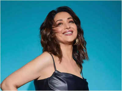 Heroines from '90s going forward in life, heroes still need to do song and dance: Madhuri Dixit