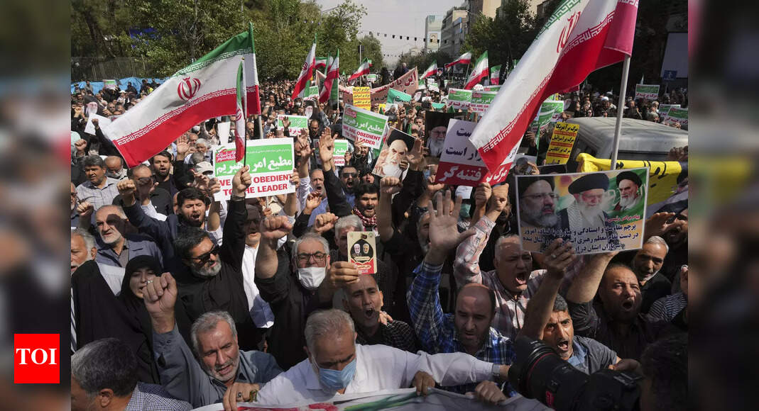 Pro-government rallies held in Iran amid mass protests – Times of India