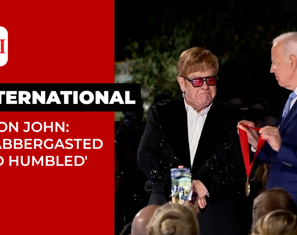 
Elton John gets emotional as Biden surprises him with National Humanities Medal
