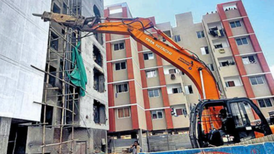 Ahmedabad Municipal Corporation razes apartment block being built illegally in Juhapura