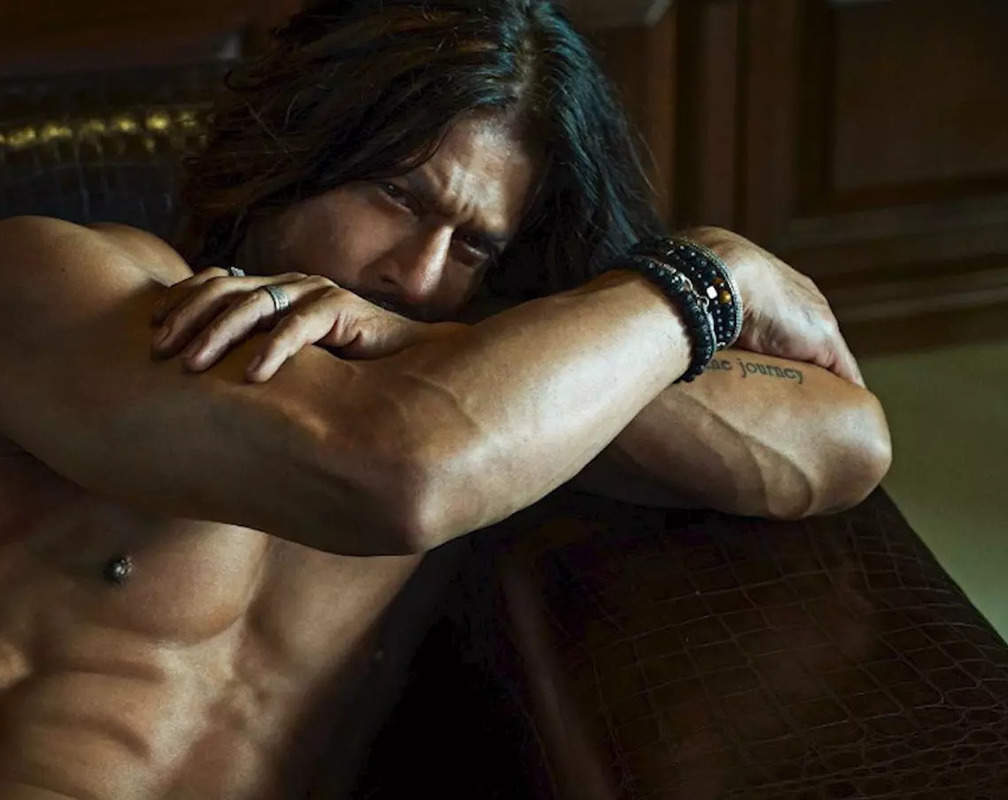 
Shah Rukh Khan shares shirtless picture flaunting his toned abs and long locks: 'Tum hoti toh kaisa hota….'
