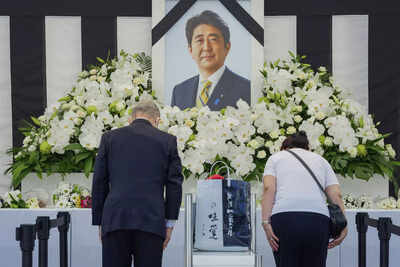Abe's militaristic funeral captures Japan's tense mood