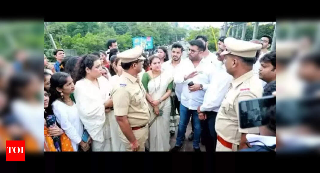 Activists gherao exam director, seek postponement of exams – Times of India