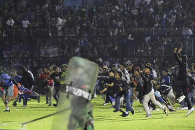 'Too many fans allowed in Indonesia soccer stadium where stampede took place'