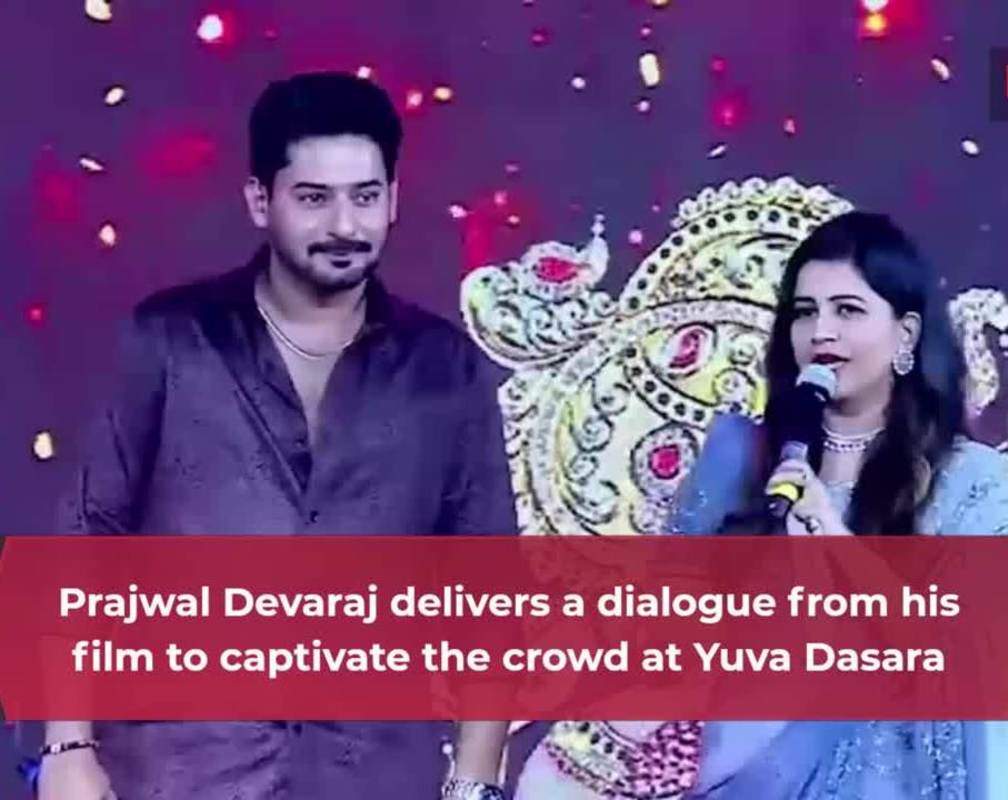 
Prajwal Devaraj delivers a dialogue from his film to captivate the crowd
