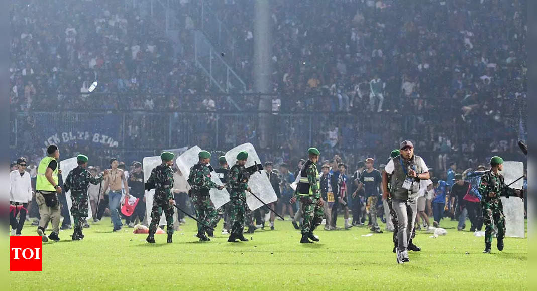Explainer: What’s behind Indonesia’s deadly soccer match | Football News – Times of India