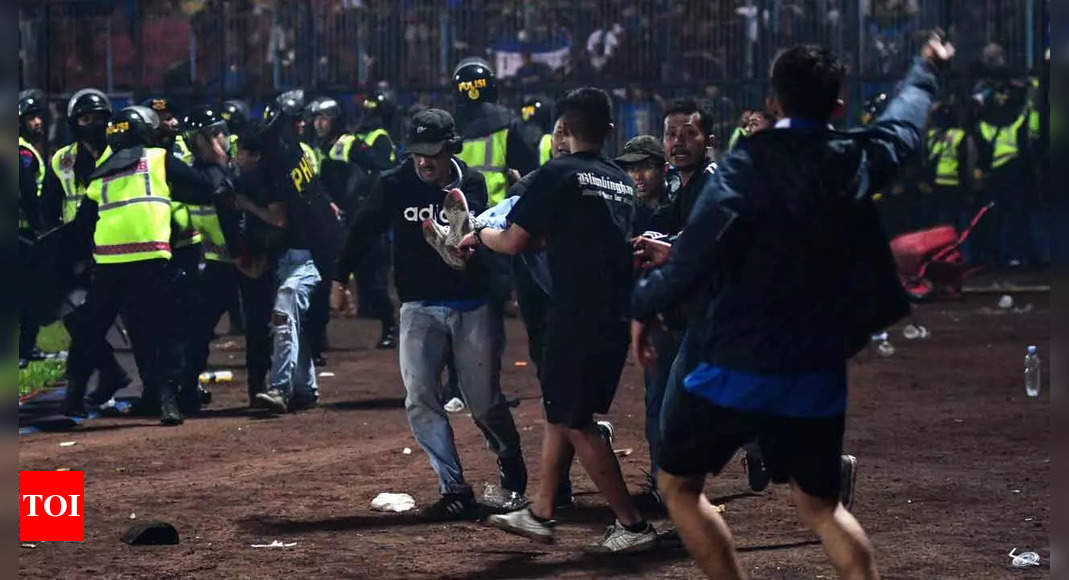 Seventeen children among the dead in Indonesian football stampede | Football News – Times of India
