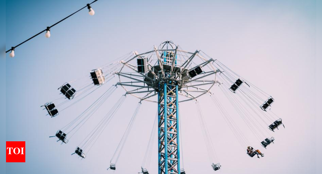 Delhi Woman, 10yearold injured in carnival ride accident Delhi News Times of India