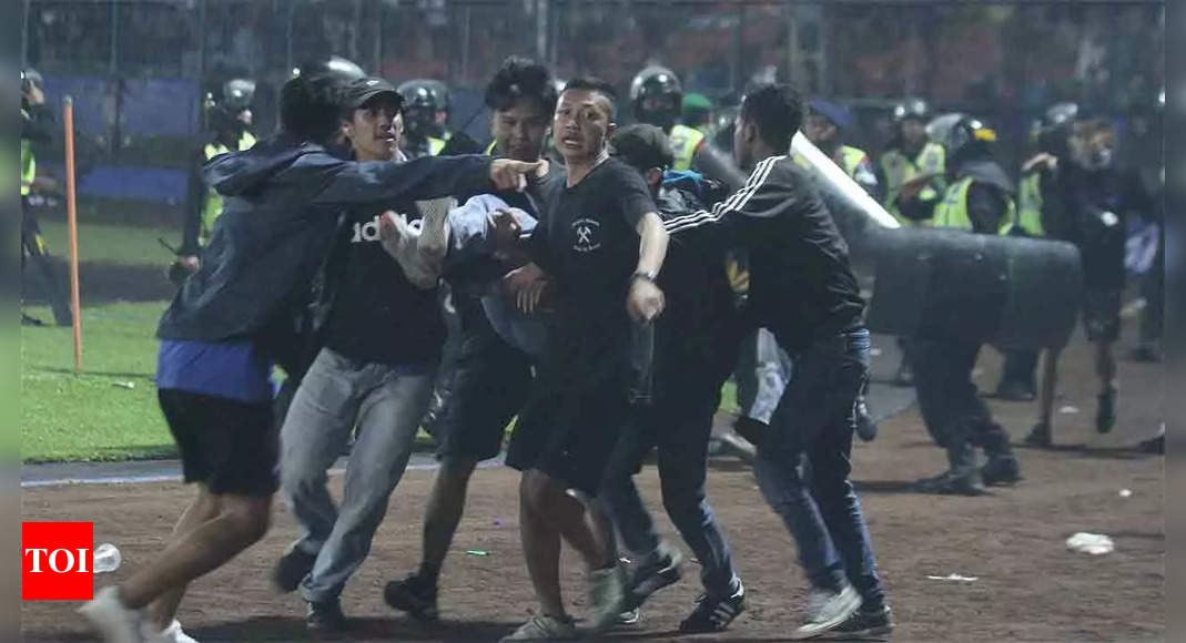 ‘A time to help’: Indonesians ran to aid of fleeing fans in stadium stampede | Football News – Times of India