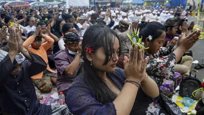 Fans mourn victims of Indonesian stadium crush at Friday prayers