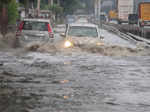 Gurugram: Vehicles wade through the waterlogged Delhi-Gurugram Expressway servic...