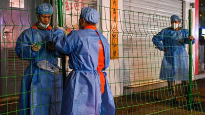 China imposes lockdowns as Covid-19 surges after holiday