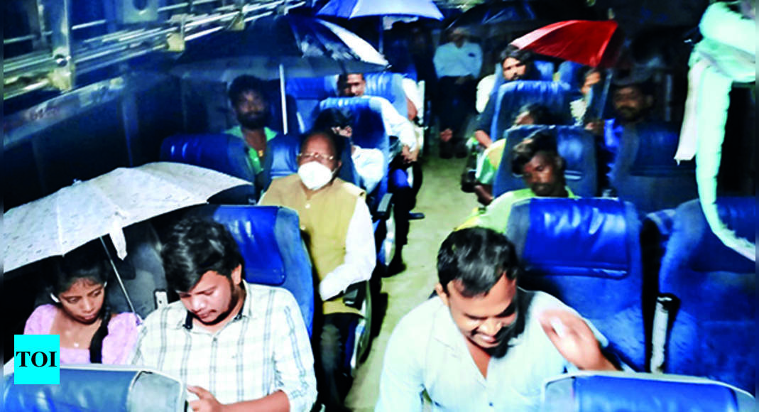 Passengers Unfold Umbrellas On Leaky Bus | Visakhapatnam News - Times ...