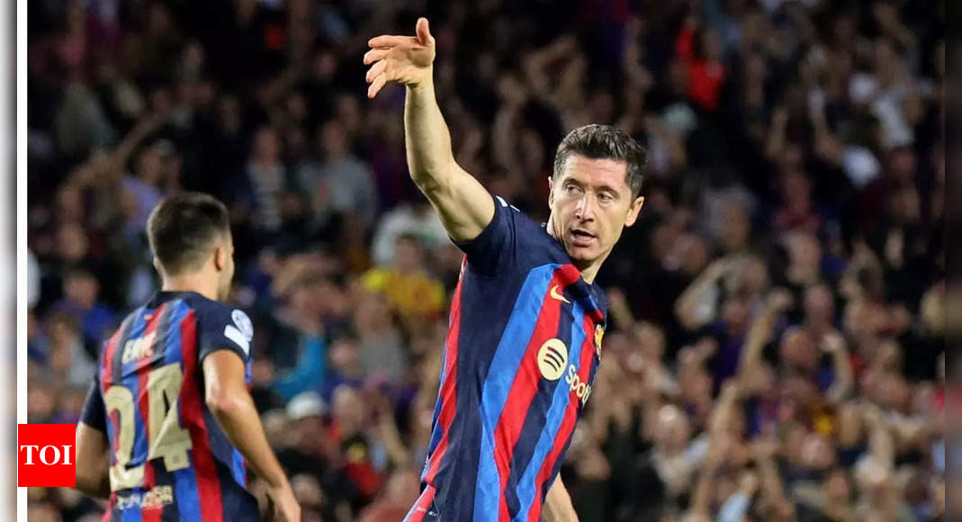 Champions League: Robert Lewandowski late show rescues Barcelona but early exit looms | Football News – Times of India