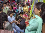 Kullu: Women get henna applied on their hands on the eve of 'Karwa Chauth' in Ku...